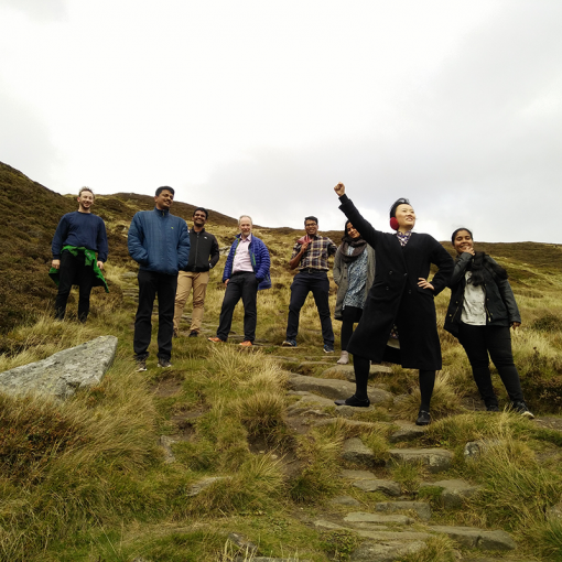 INSPIRED-GoDARTS 20th Anniversary-Post Doc Yu Huang strikes a pose half way up Ben Vrackie